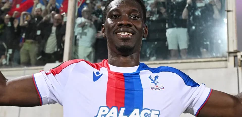 Player celebrating in Crystal Palace jersey