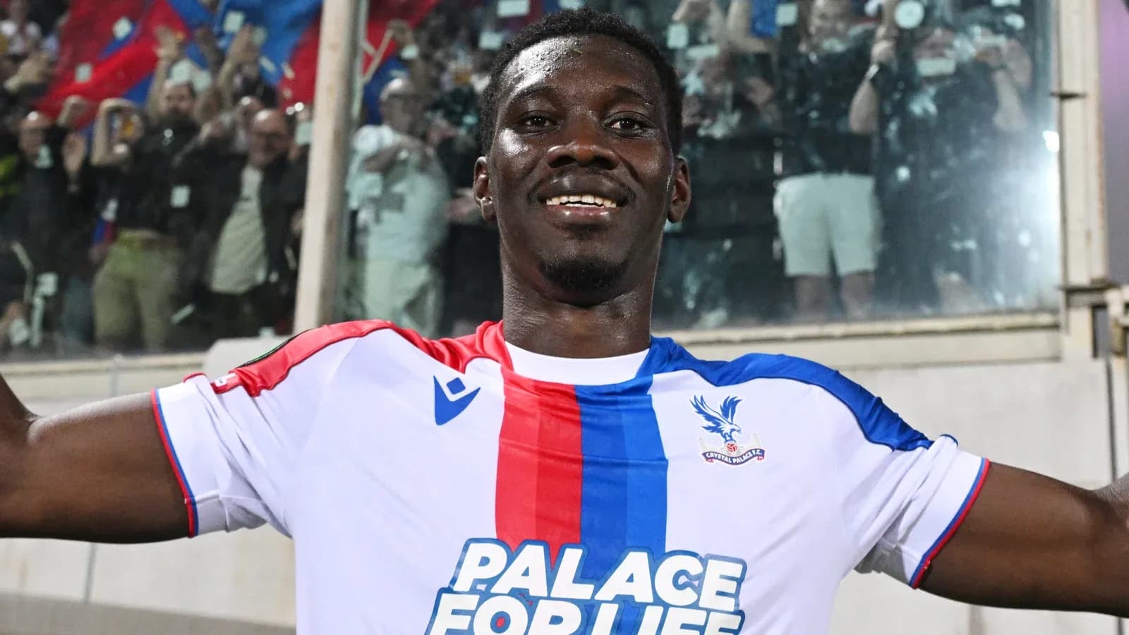Player celebrating in Crystal Palace jersey