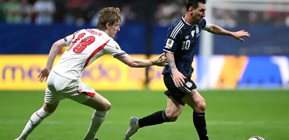 Player dribbling the ball while being chased
