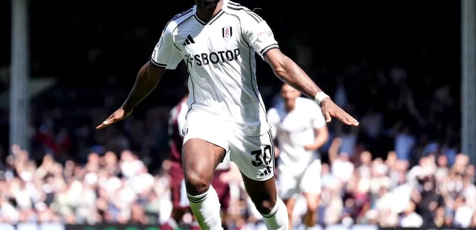 Fulham player celebrating a goal during match