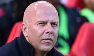 Coach observing the game from the sidelines