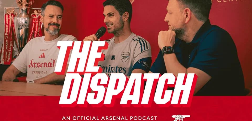 Podcast hosts discussing Arsenal at press table