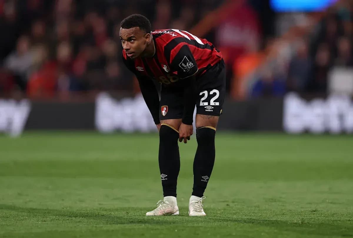 Bournemouth player bending over on the pitch