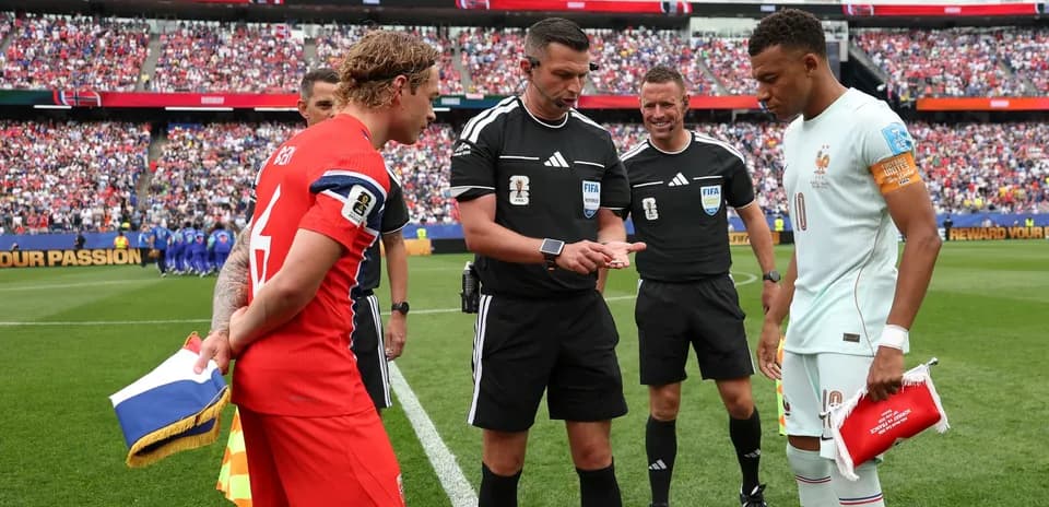 Captains exchanging coins before the match starts