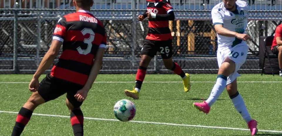 Player kicking ball during York United match