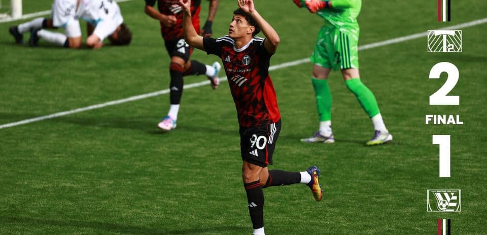 Player celebrating goal in Town vs Portland Timbers II match
