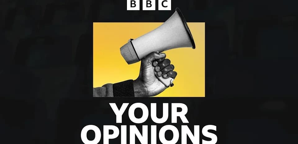 Hand holding a megaphone against yellow background
