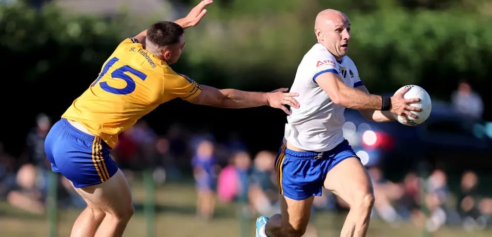Player running with the ball, defender reaching out