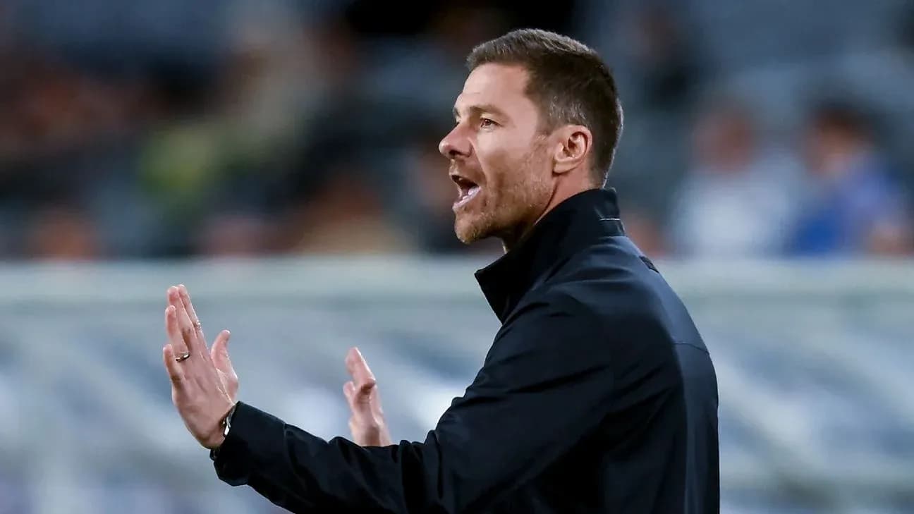 Coach gesturing during a match on the sidelines
