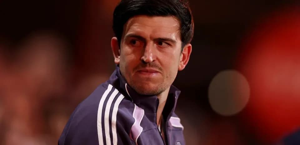Player sitting on the bench during match warm-up