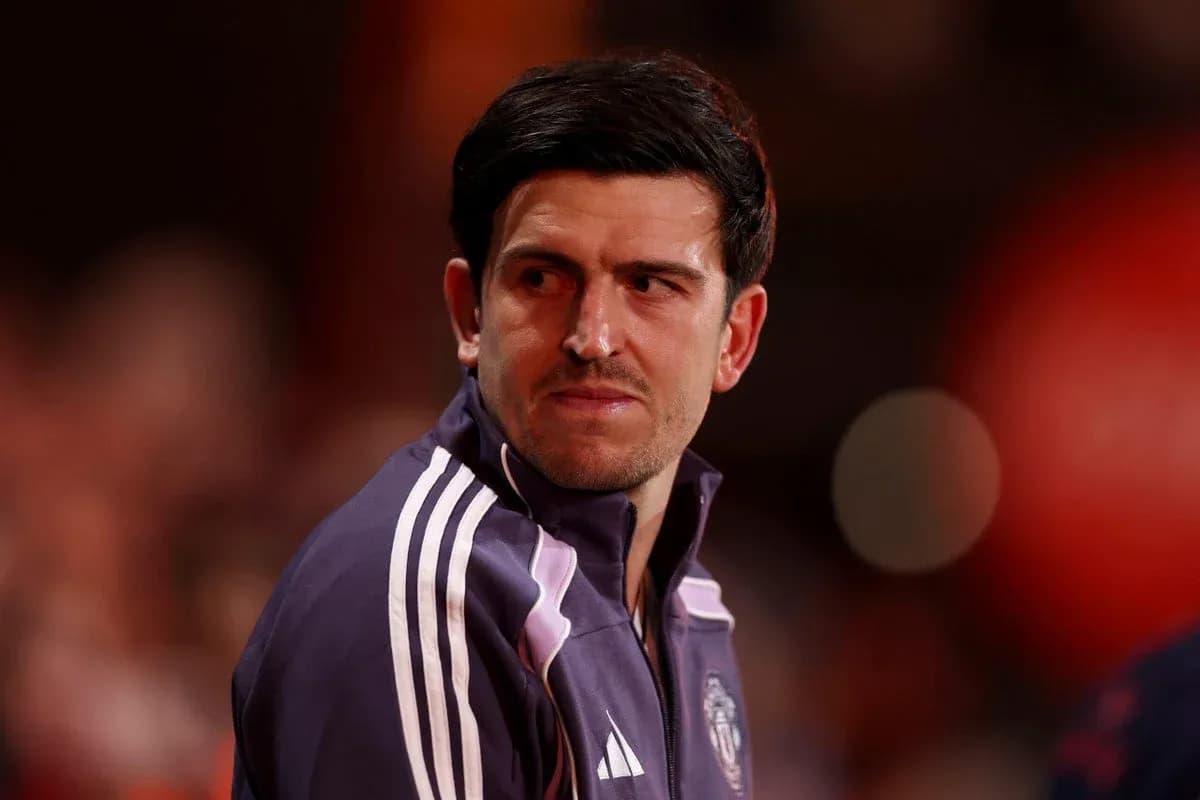 Player sitting on the bench during match warm-up