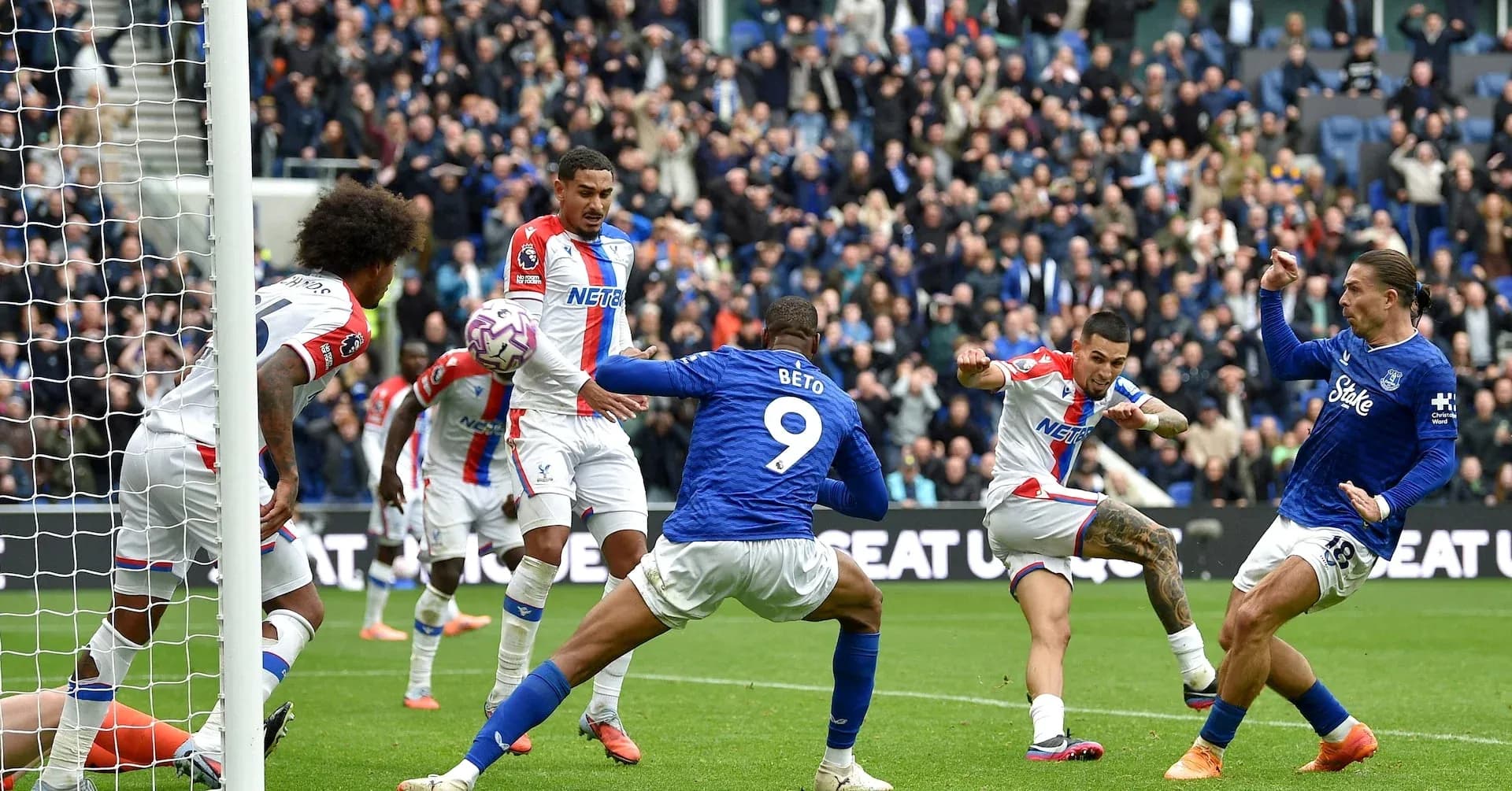 Players contesting for the ball during match action