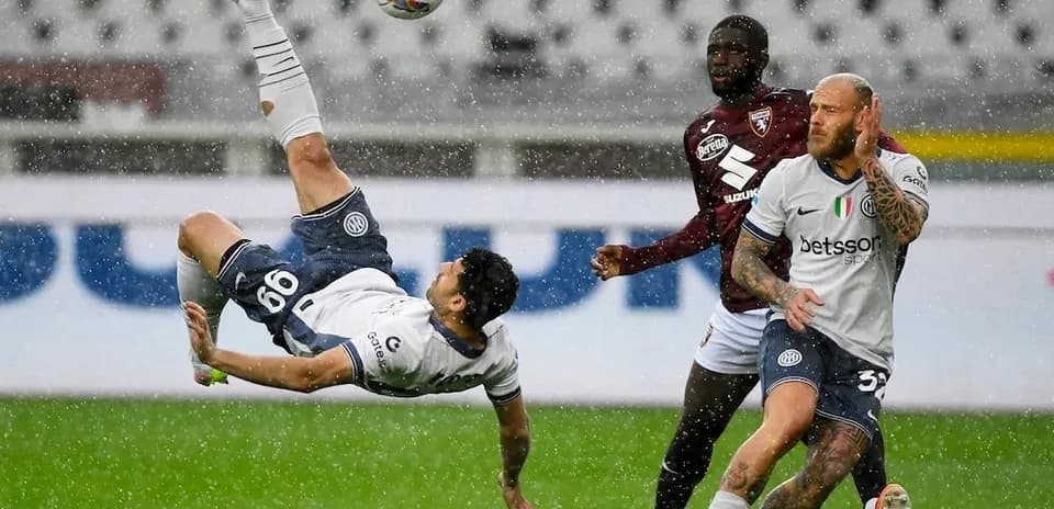Player performing a bicycle kick during match