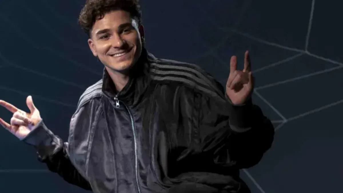 Person posing with peace sign and smile