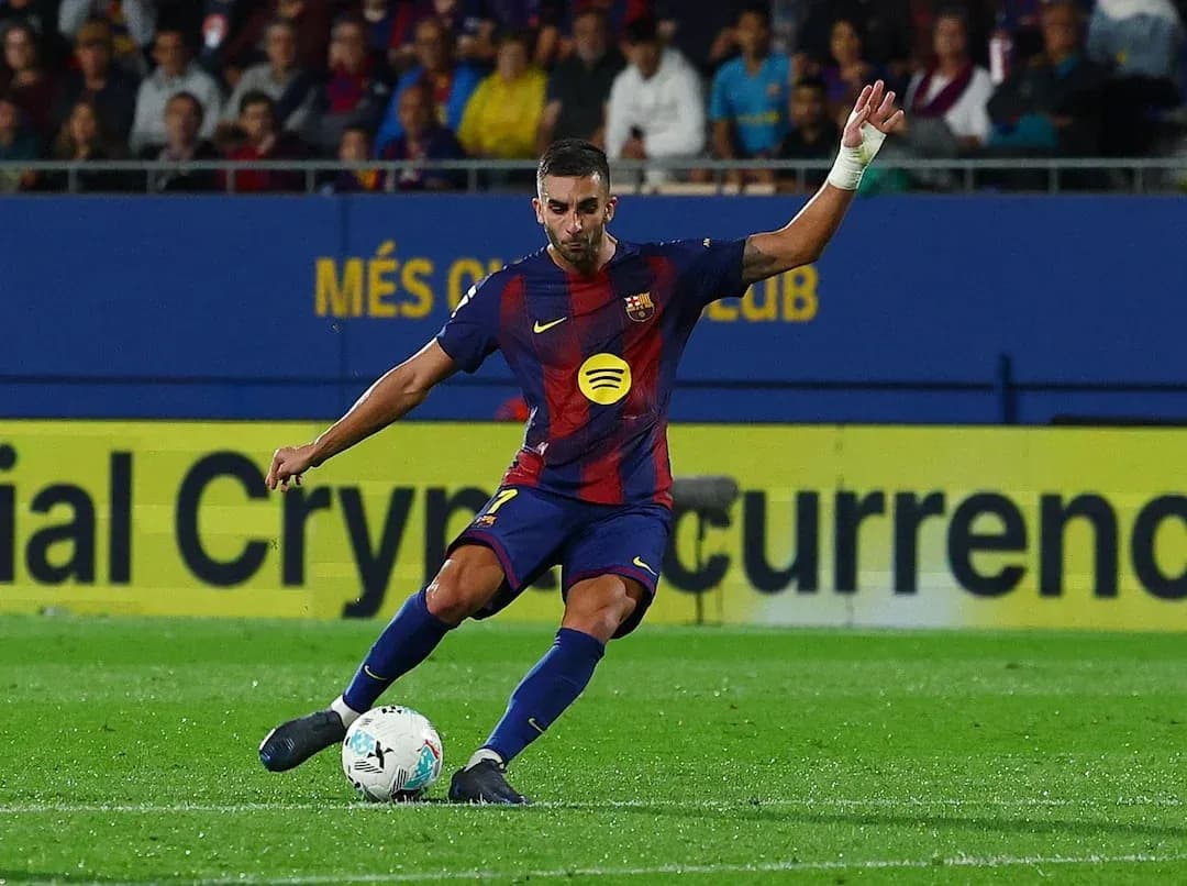 Barcelona player taking a free kick