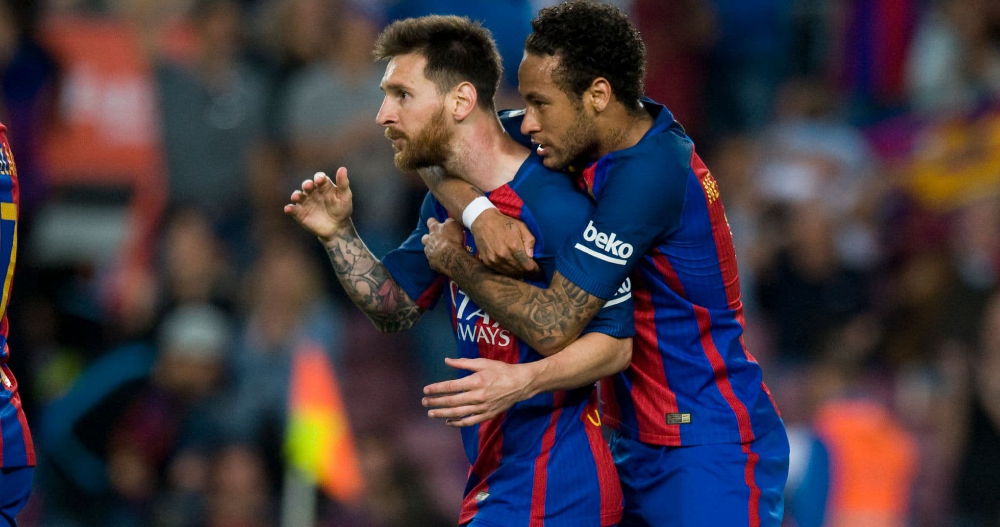 Lionel Messi and Neymar celebrating a goal together