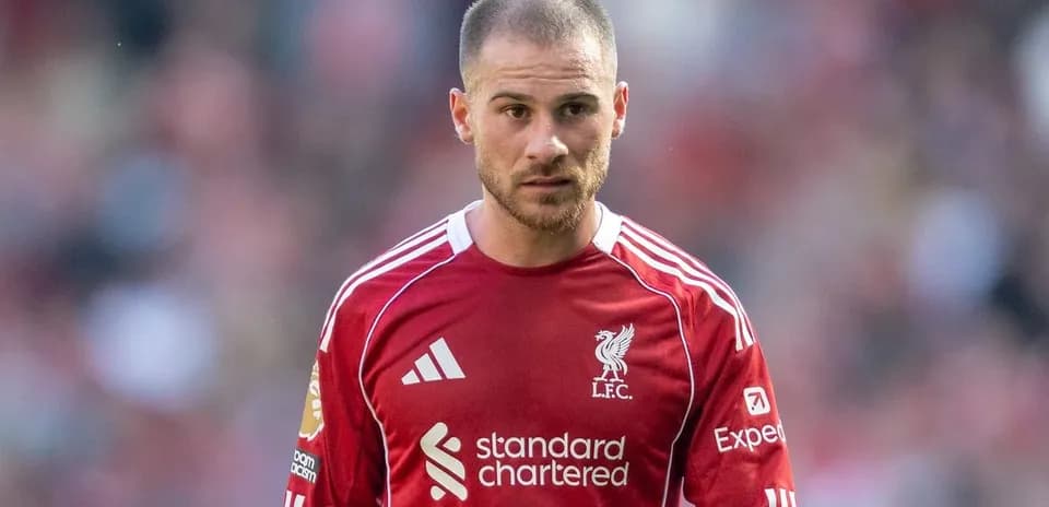 Player in Liverpool jersey on the pitch