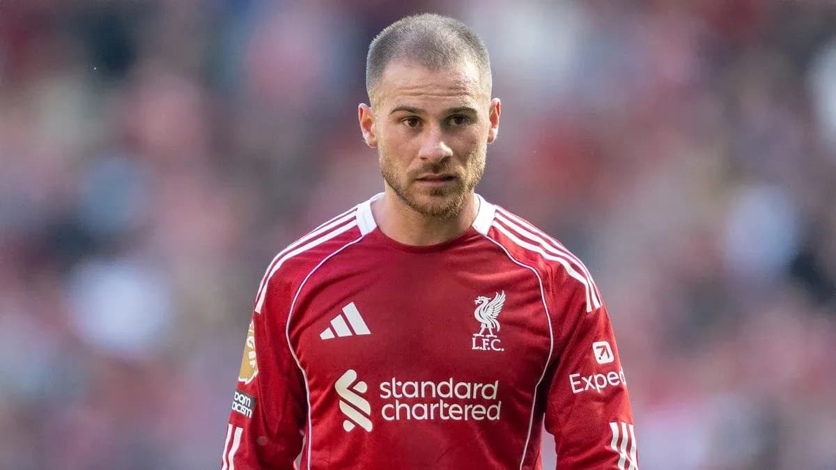 Player in Liverpool jersey on the pitch