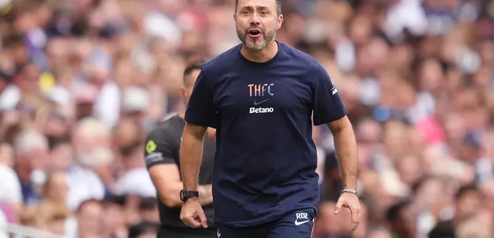 Coach directing players during a match