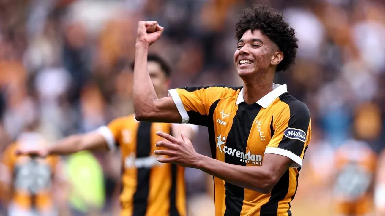 Player celebrating a goal on the pitch