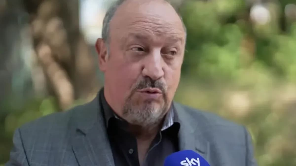 Football manager speaking during outdoor interview