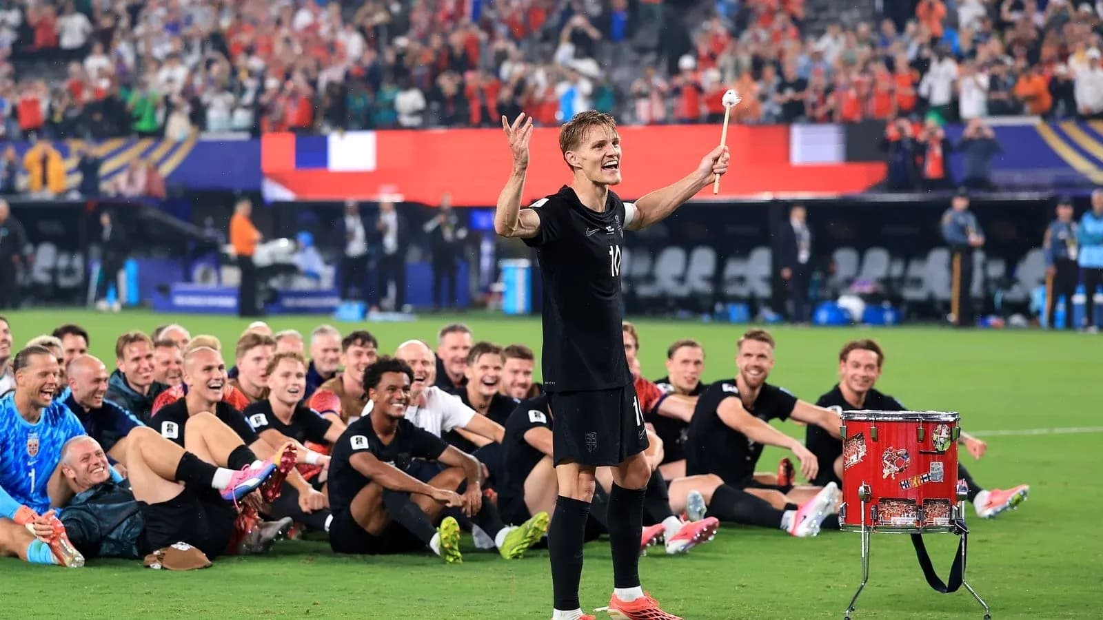Player celebrating with teammates after victory