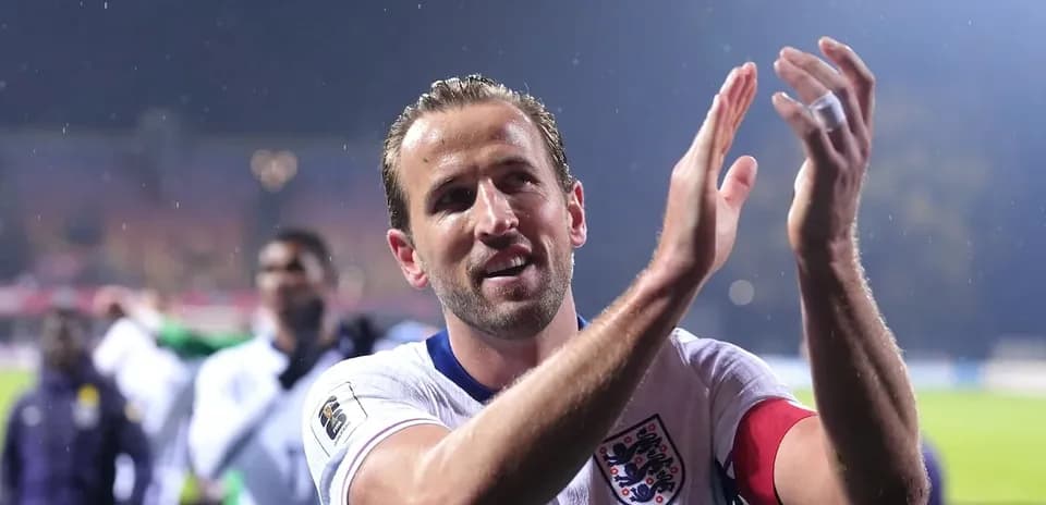 Player applauding fans after the match