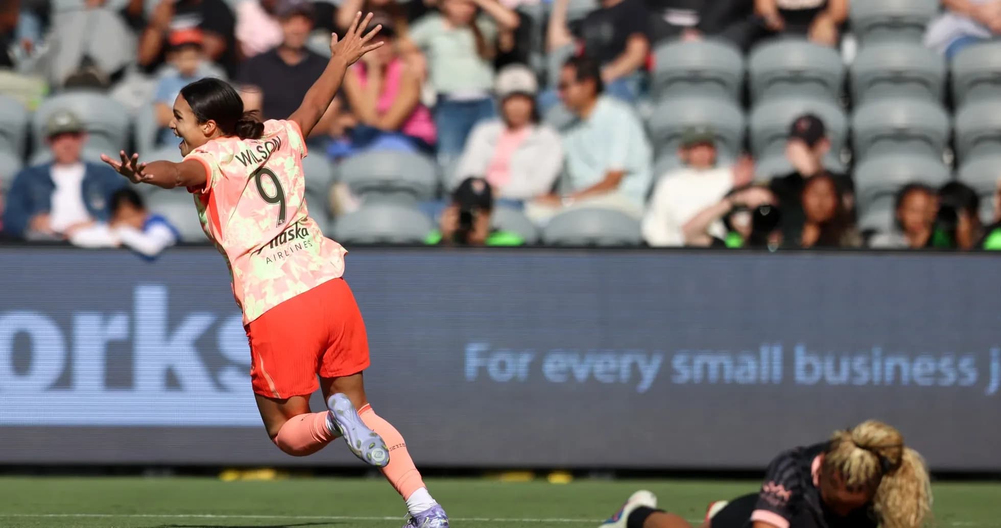 Player celebrating during NWSL match