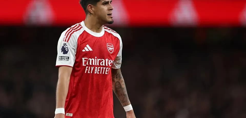 Arsenal player on field during match action