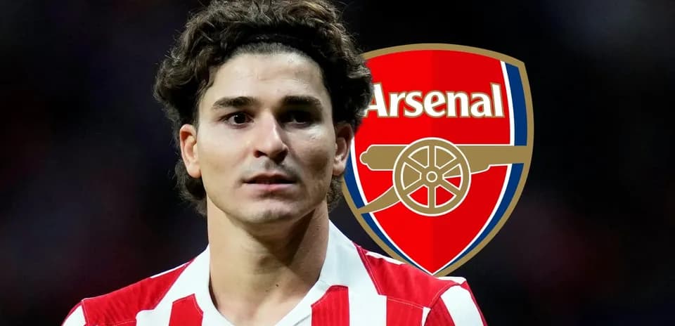 Player in red and white jersey with Arsenal logo