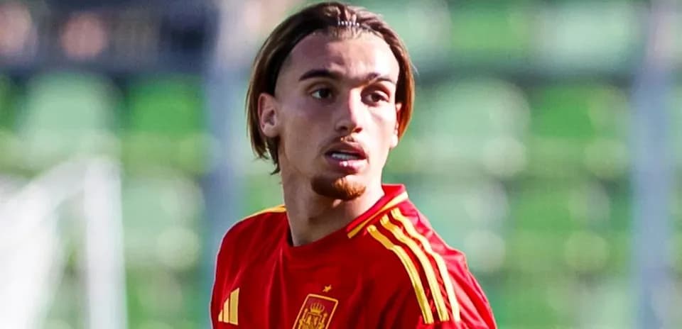 Player wearing Spain national team jersey on field