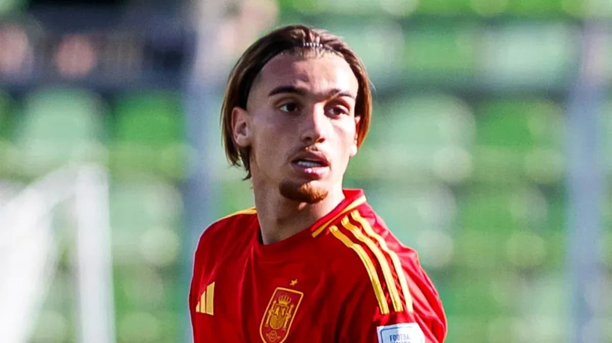 Player wearing Spain national team jersey on field