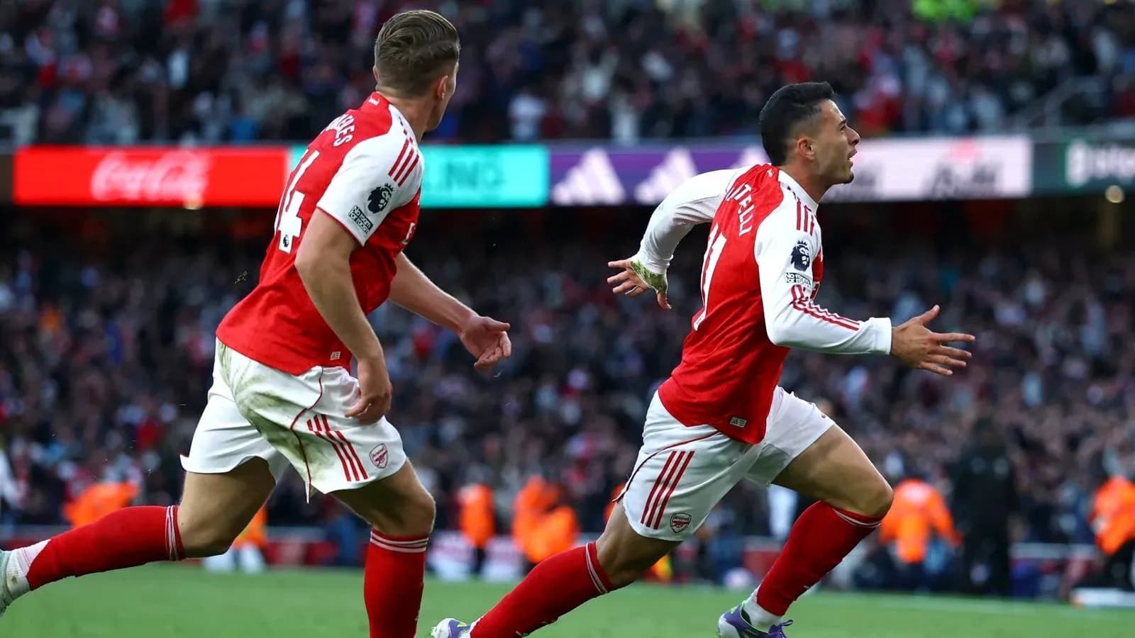 Arsenal players celebrating a goal during match