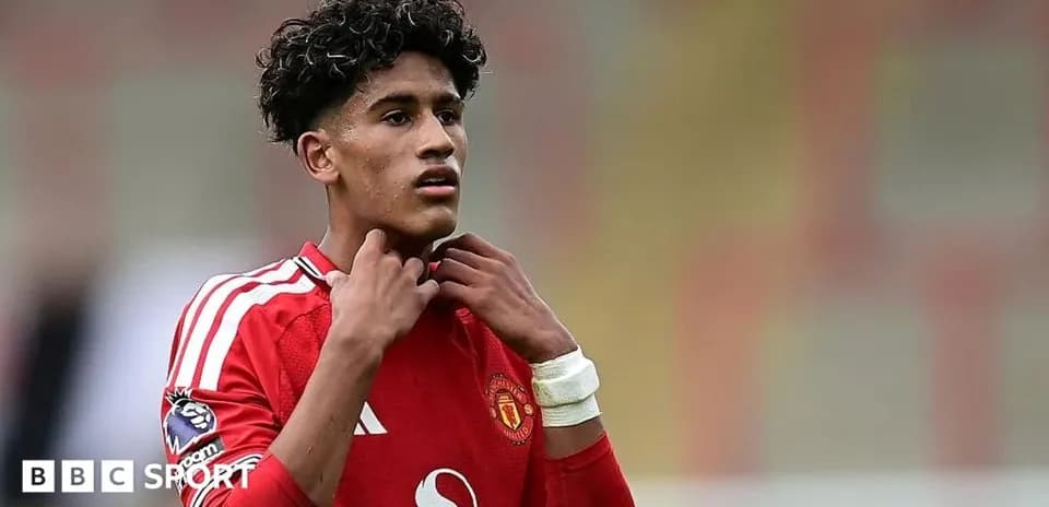 Young player adjusting his collar during match