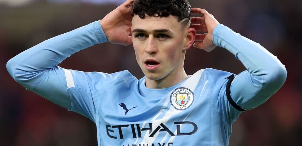Phil Foden reacting during a Manchester City match