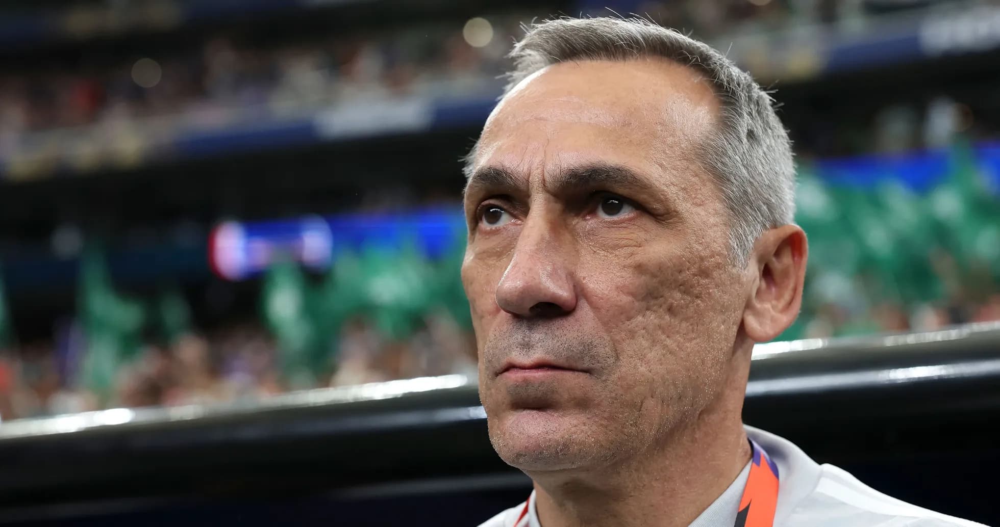 Coach focused during a match at stadium