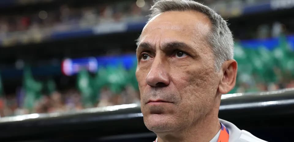 Coach focused during a match at stadium