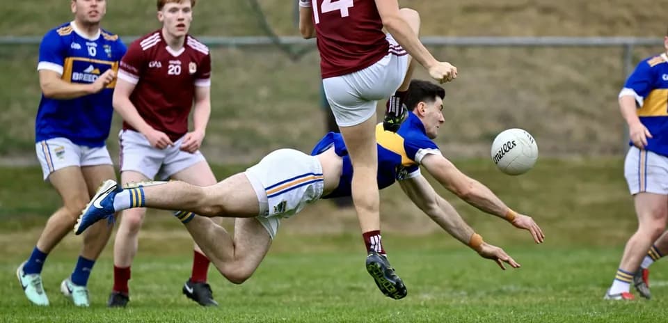 Player diving for the ball during a match