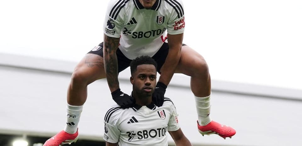 Fulham players celebrating during Premier League match