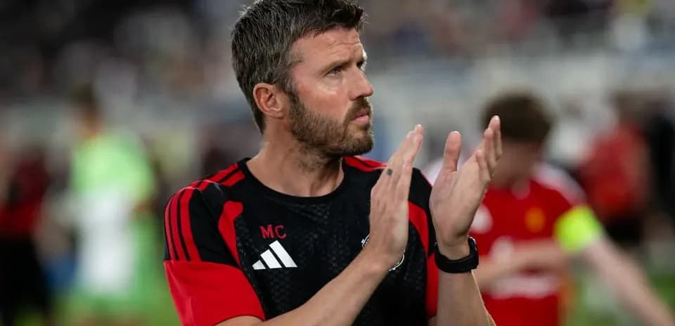 Coach applauding after match on the field