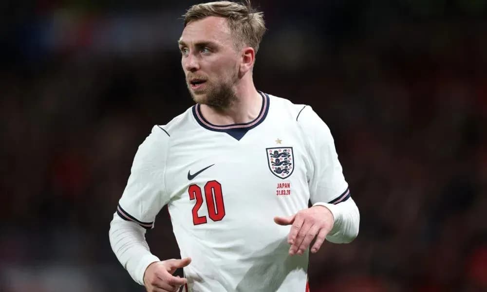Player wearing England kit during football match