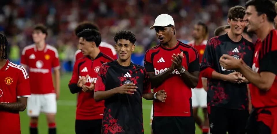 Manchester United players celebrating after a match