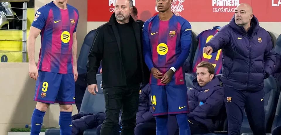 Barcelona players and coach preparing for substitution
