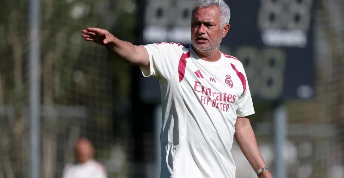 Coach directing players during training session