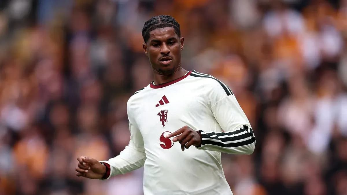 Player in white jersey during football match