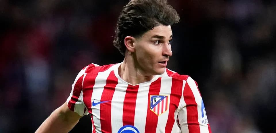 Atletico Madrid player in red and white jersey