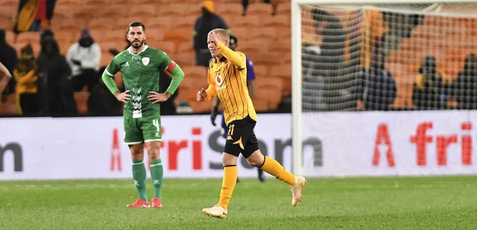 Player celebrating while opponent looks on in disappointment
