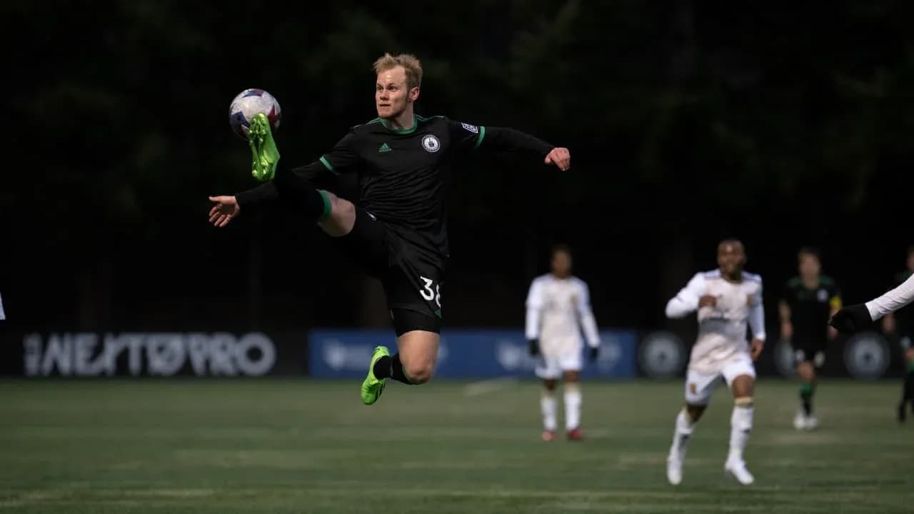 Goalkeeper making a save during match action
