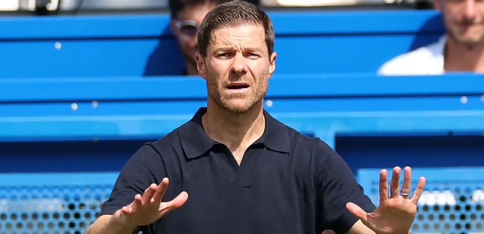 Coach directing players from the sidelines during match