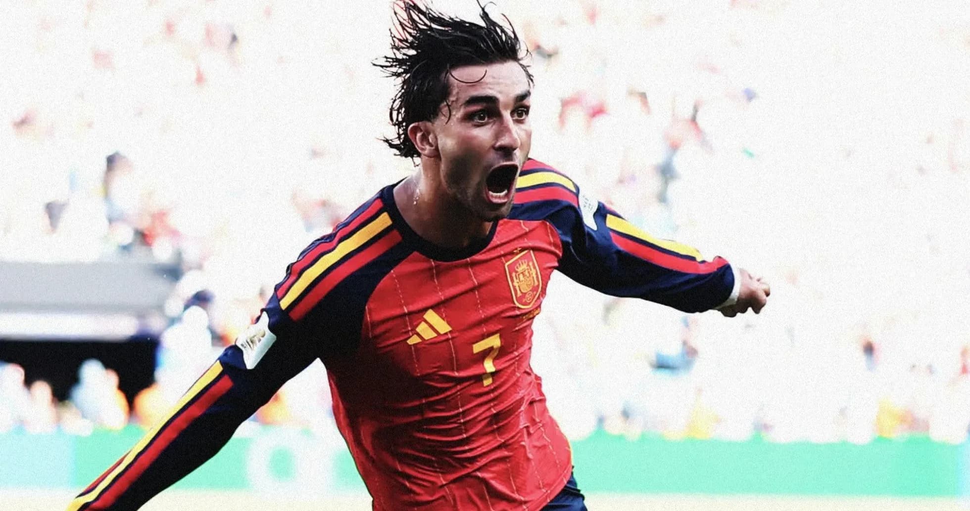 Player celebrating after scoring for Spain